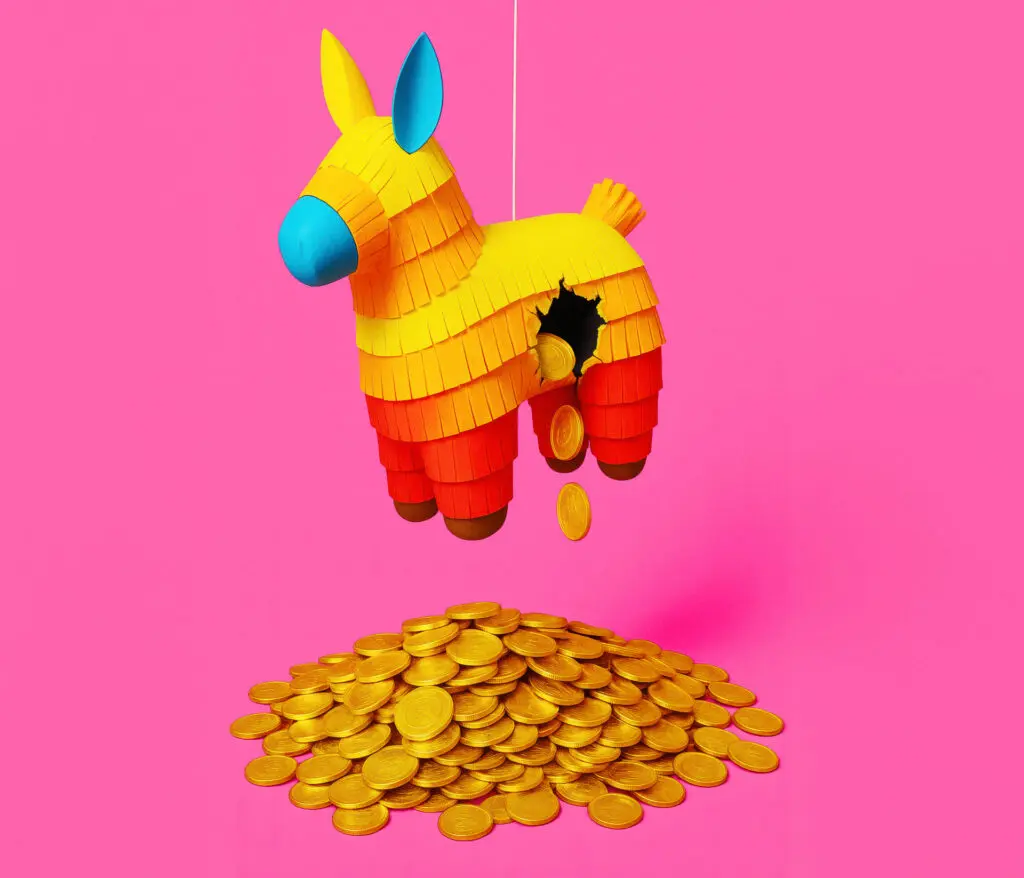 Pinata with coins coming out