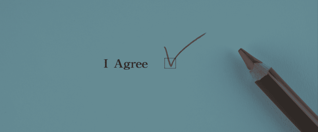 Image shows text 'I agree' with a checkbox ticked