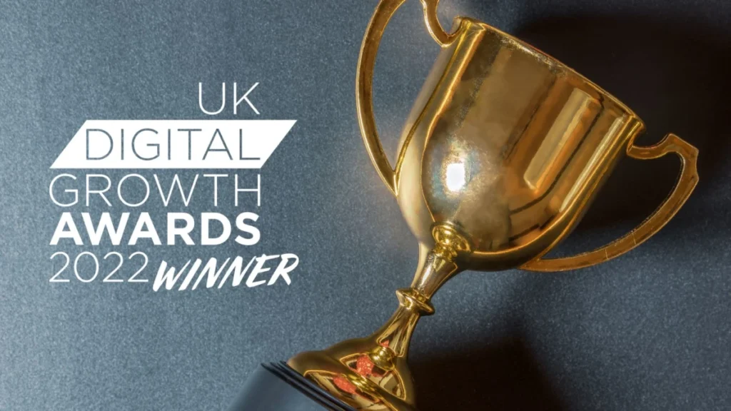 Uk Digital Growth Awards Winner 2022 written next to gold trophy image