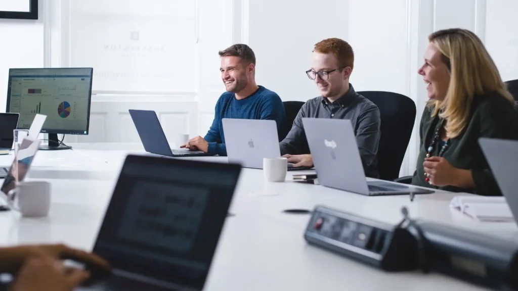 Team with laptops