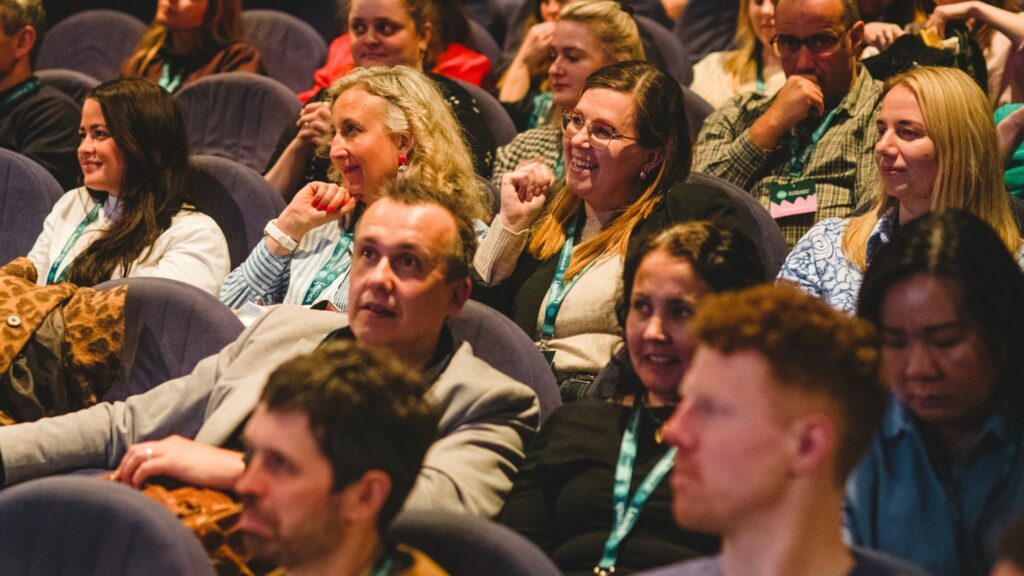 An audience listens intently at the CMO's Guide to Performance marketing