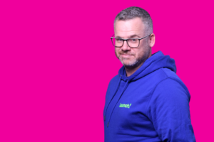 Mike Sharp on pink background