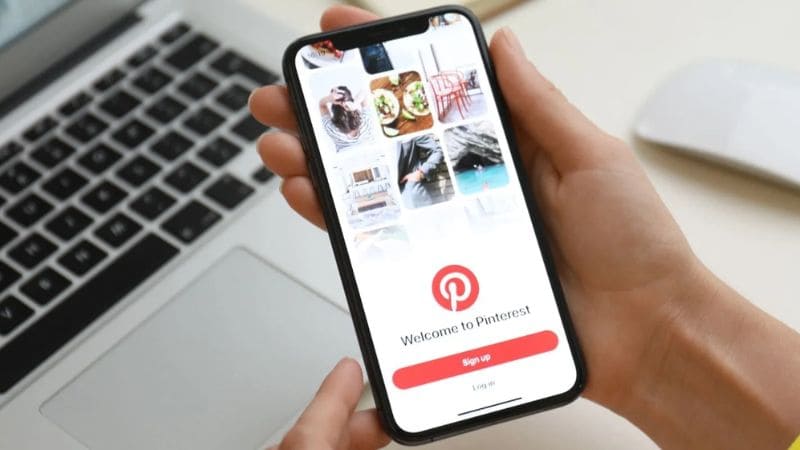 Pinterest on a phone screen in someones hands
