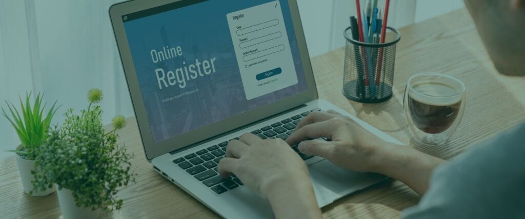 Someone fills in an online form on a laptop screen